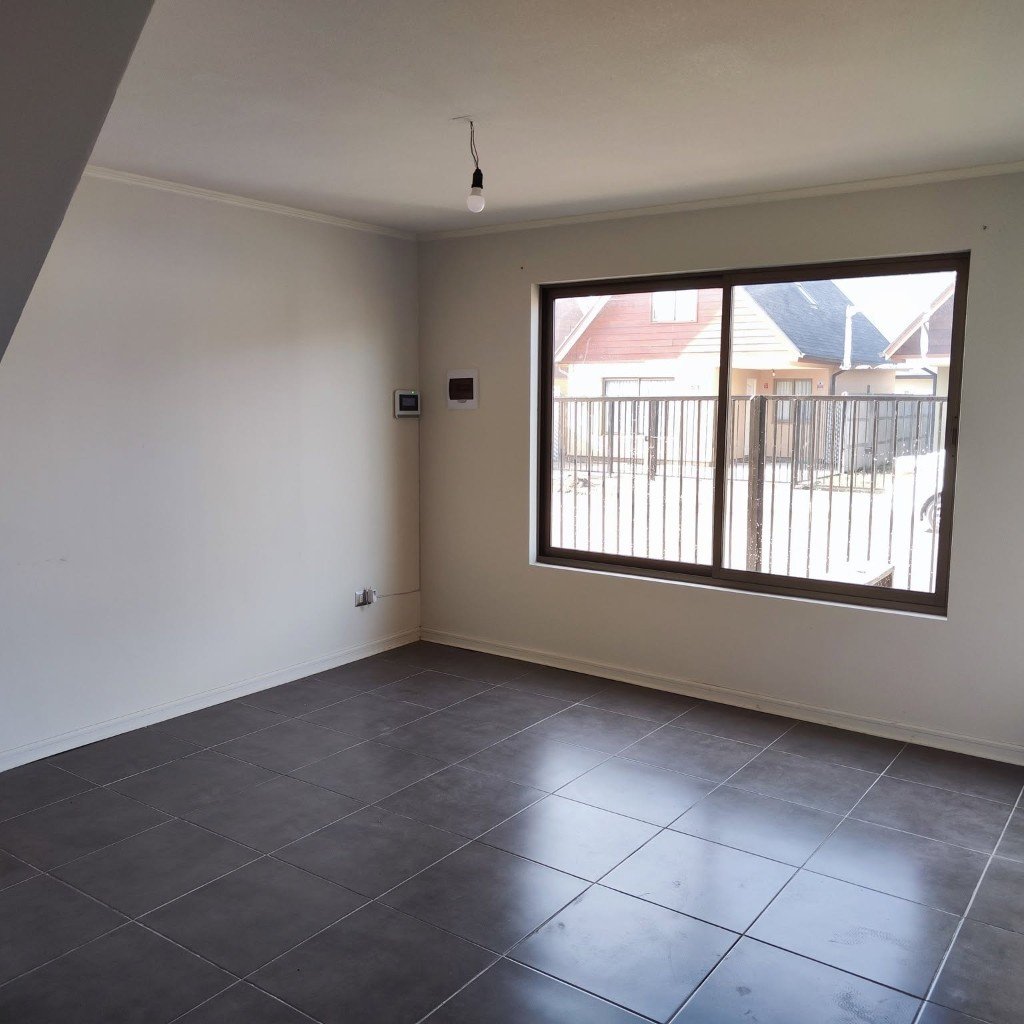 Living de la casa nueva en Av. Las Verbenas
